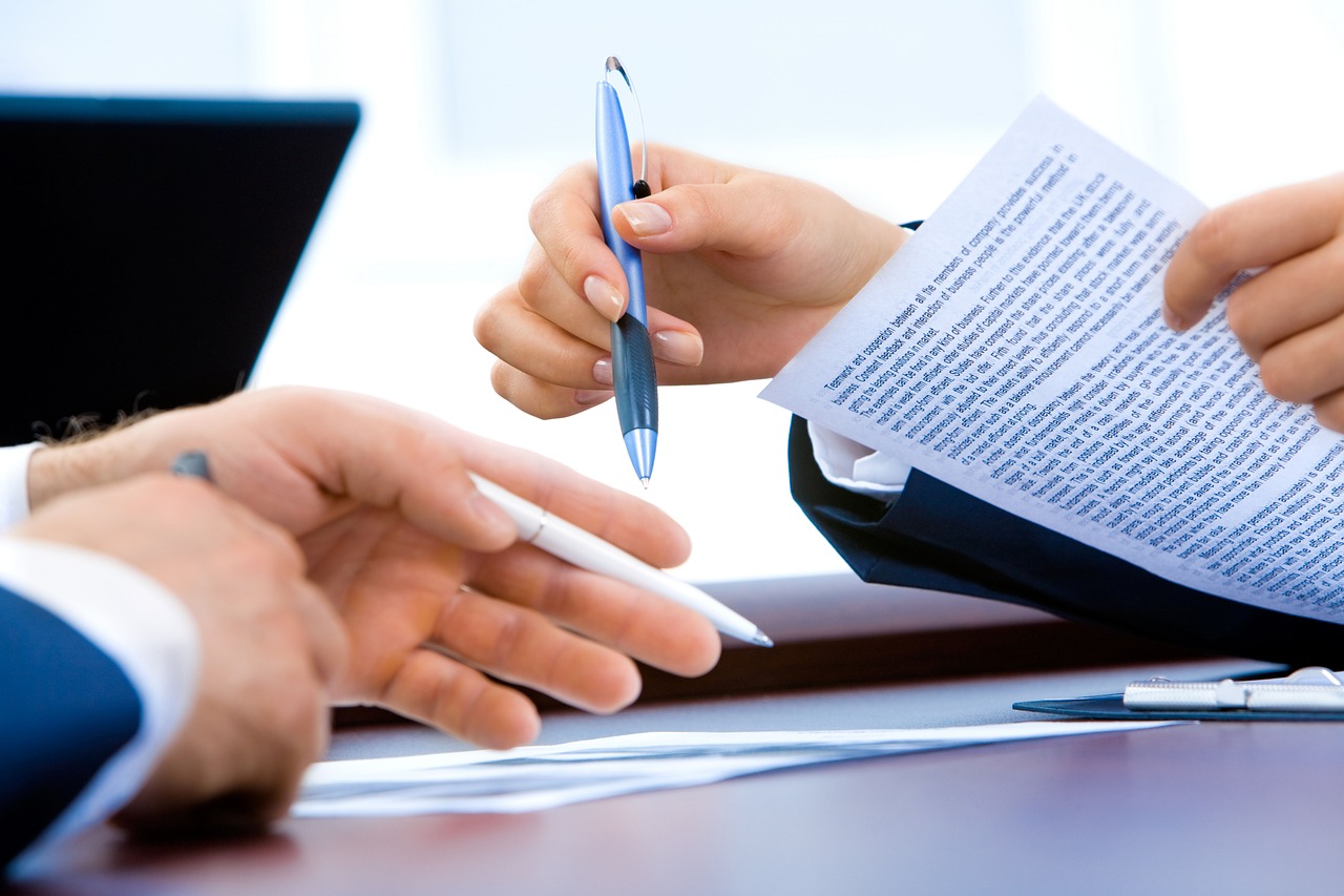 Business owner overwhelmed by scattered paperwork and documentation gaps